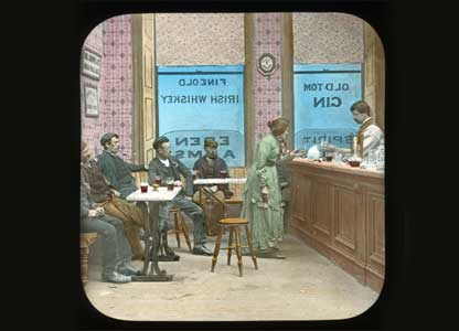 A scene from a pub with a woman at the bar: University of Bristol Theatre Collection