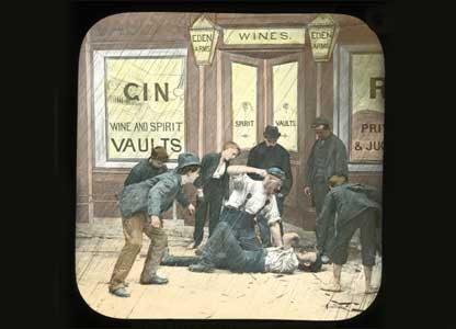 Lantern slide shows men brawling outside a pub: University of Bristol Theatre Collection