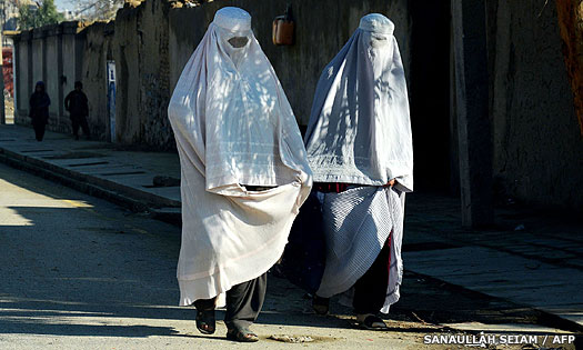 Afghan women in full Taliban-ordered coverings