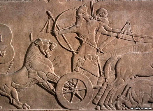 Assurbanipal II hunting a lion